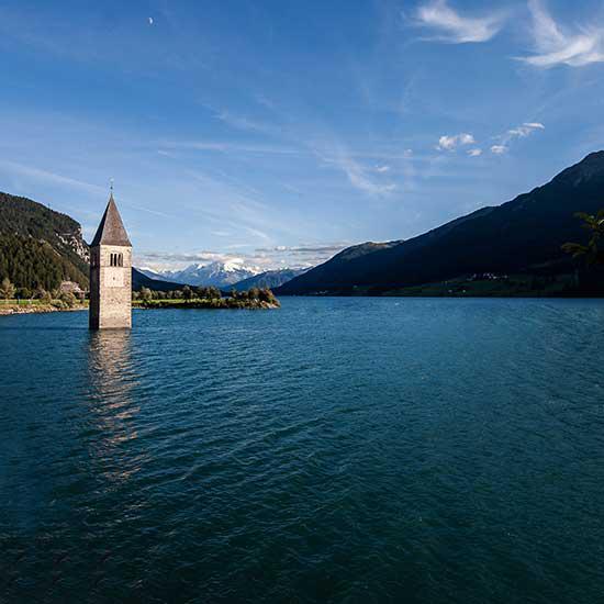 The tower of the sunken church in the Reschensee lake